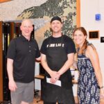 Michael and Kenna McDonald with Glen Lake Food Service Director John Fields. - Don Miller Photography